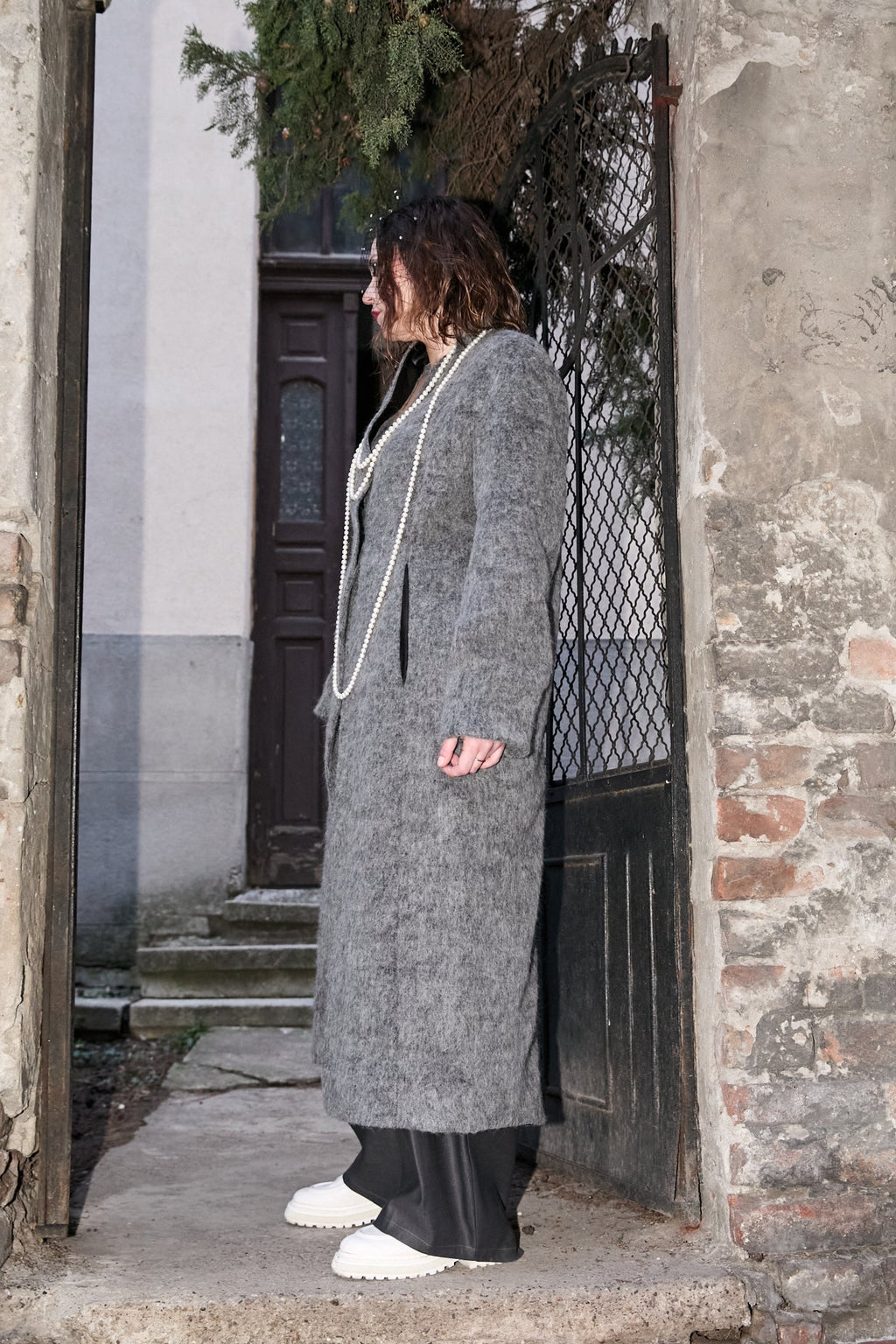 Side view of women coat from Patternalism sewing pattern #0105
