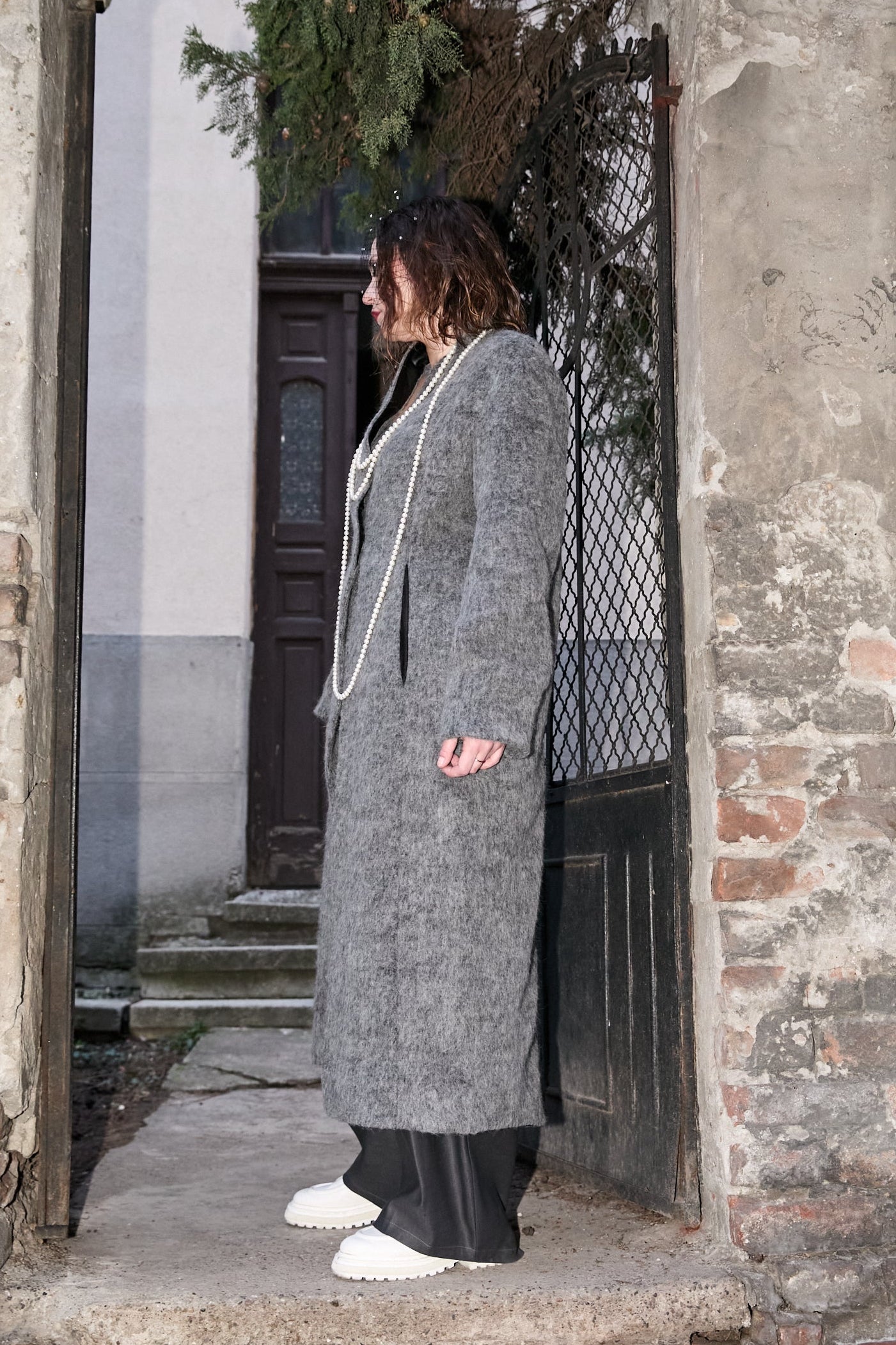 Side view of women coat from Patternalism sewing pattern #0105