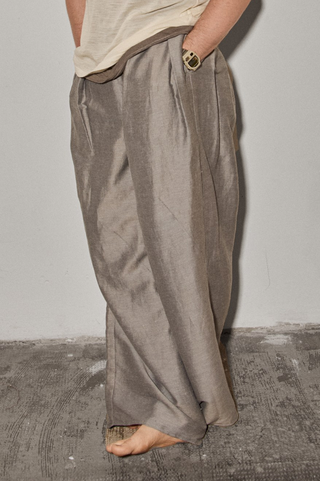 Side view of men pleated pants from Patternalism sewing pattern #0202