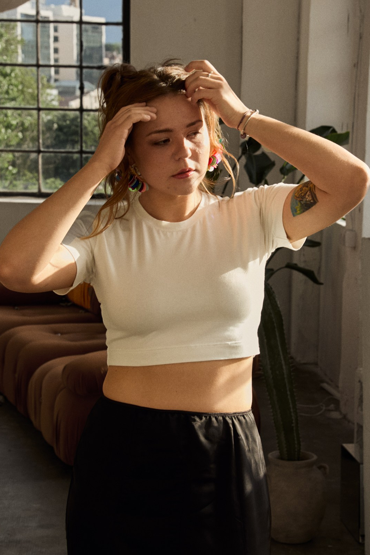 Women crop top made from Patternalism sewing pattern #0207 – front view, female model