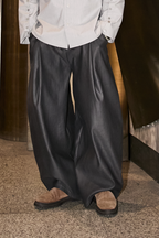 Men pleated pants made from Patternalism sewing pattern #0103 – front view, male model