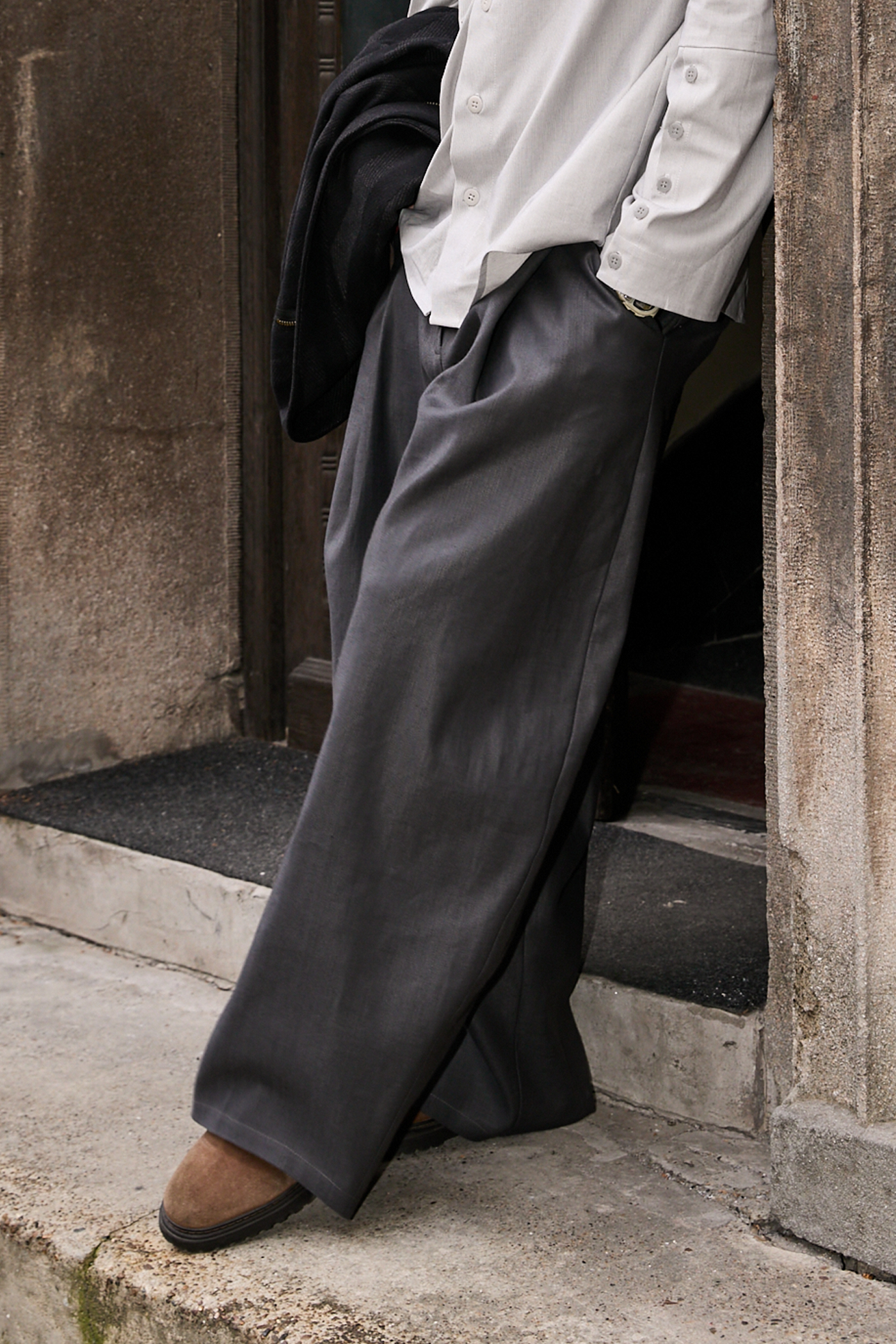 Side view of men pleated pants from Patternalism sewing pattern #0103